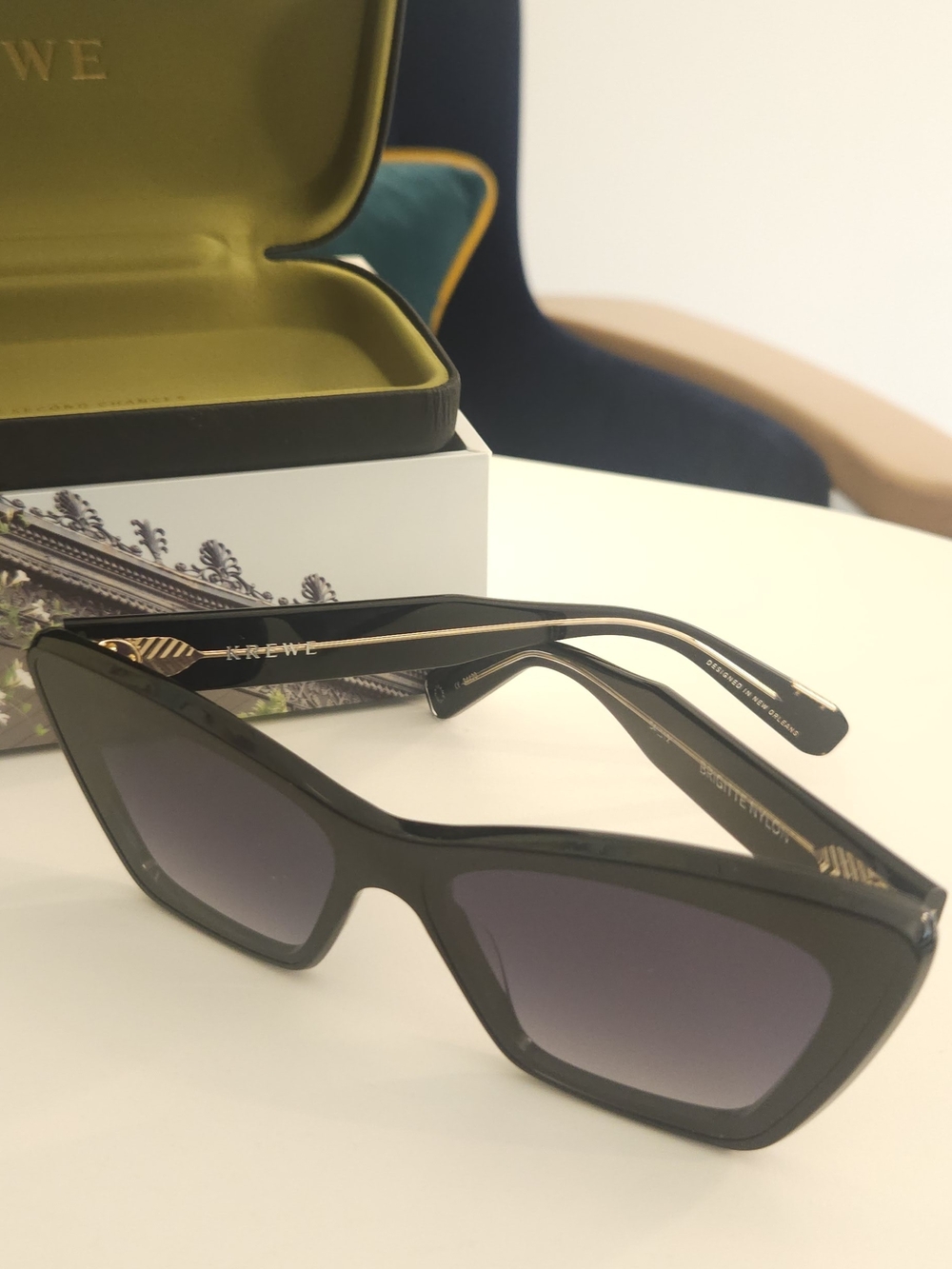 KREWE Black Cat-Eye Sunglasses with Gold Temples and Gradient Lenses
